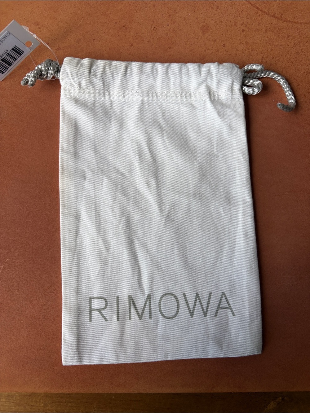 RIMOWA White Drawstring Pouch with Silver Cord